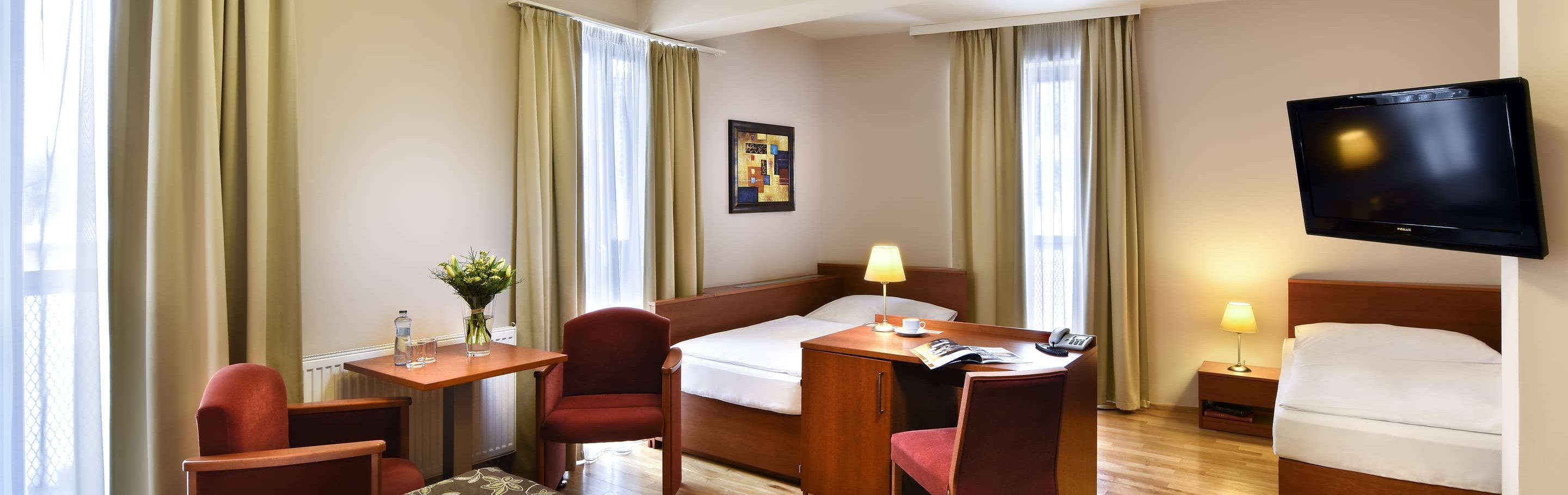 Obývací zóna pokoje 307 v Chateau Orlice